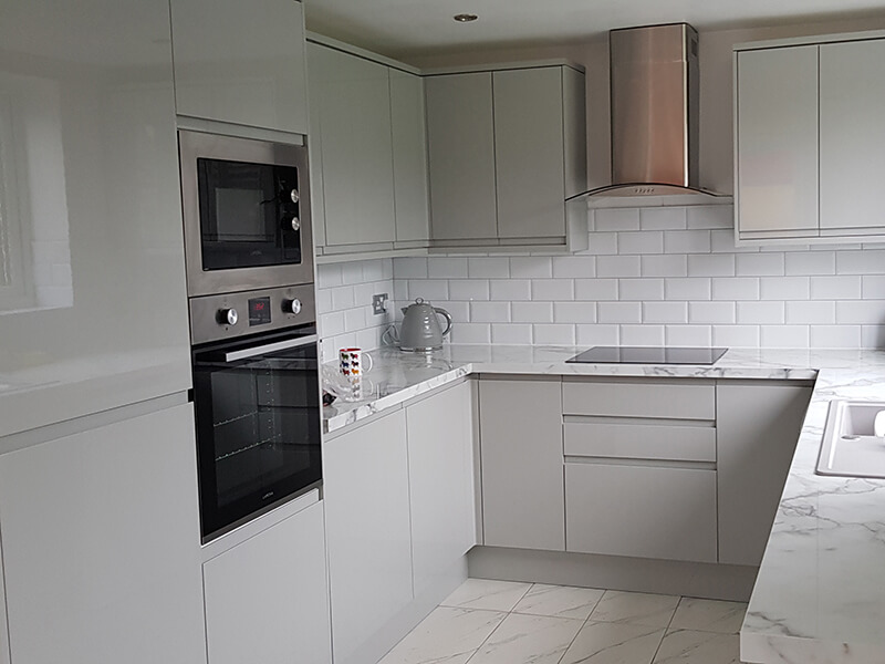 Modern white kitchen with subway tiles Wrexham